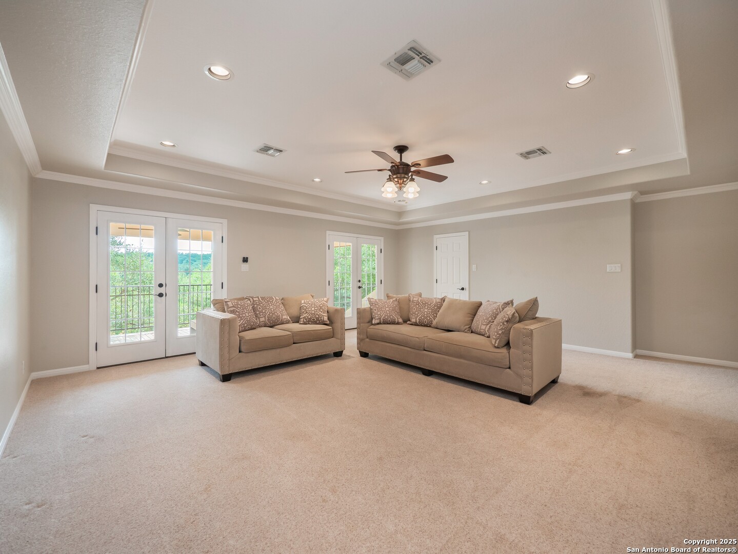 429 Fossil Hills Loop Spring Branch, TX 78070 - Photo 29 of 64 a living room with furniture and a large window