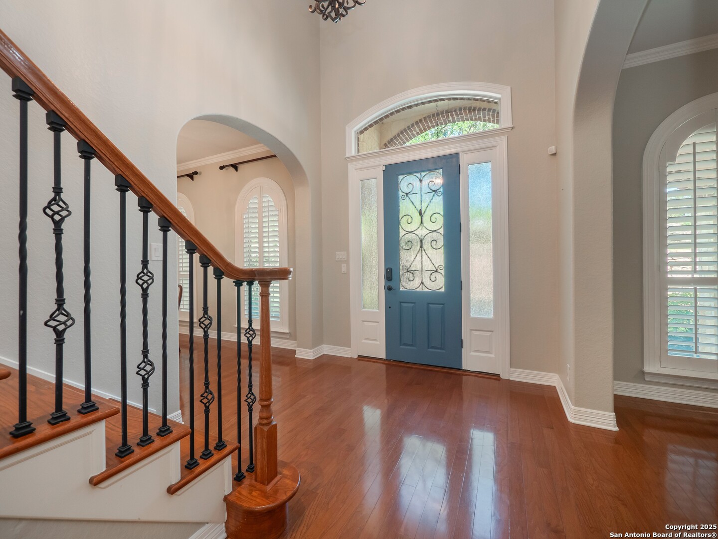 429 Fossil Hills Loop Spring Branch, TX 78070 - Photo 3 of 64 a view of an entryway with wooden floor and windows