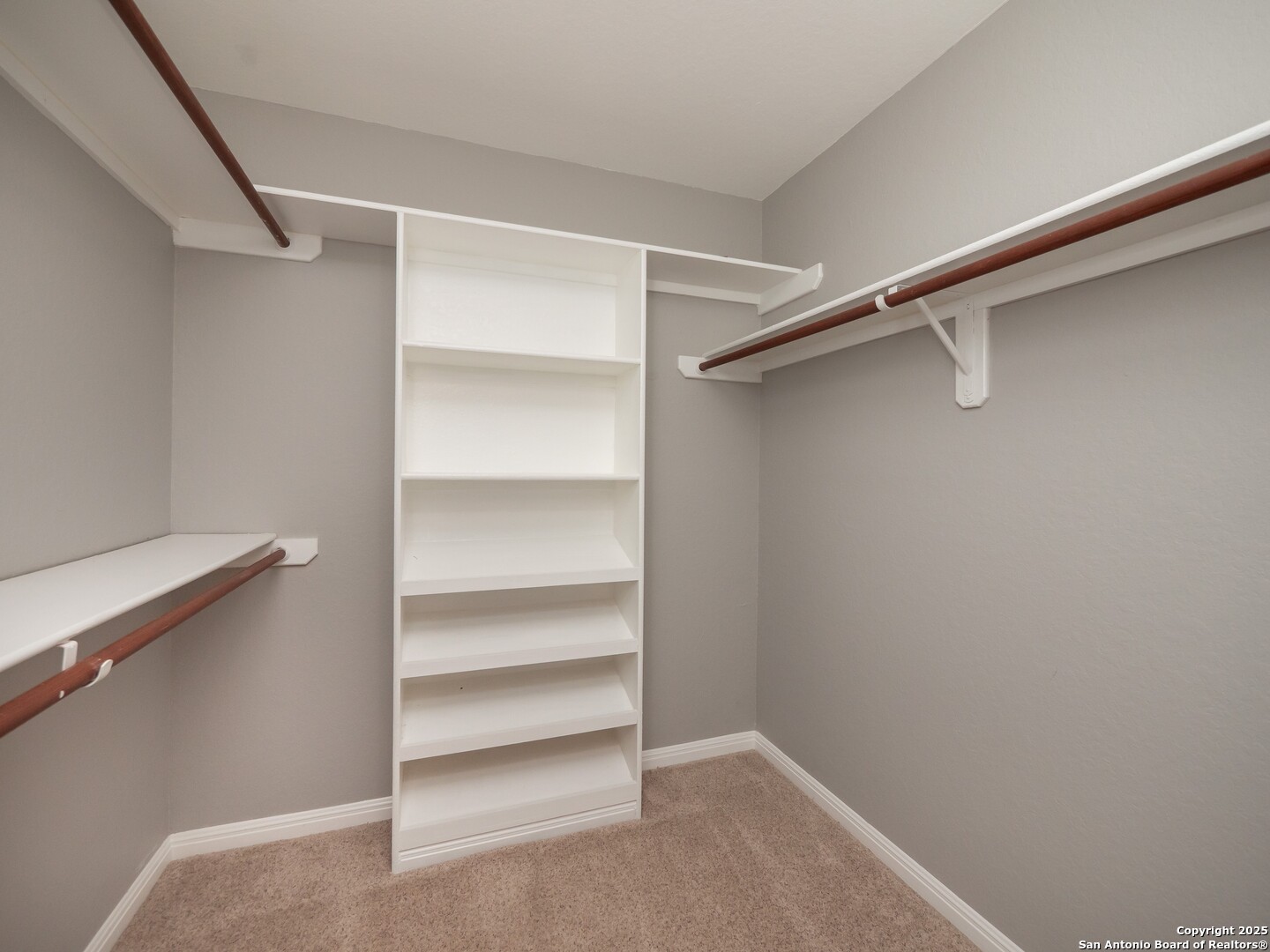 429 Fossil Hills Loop Spring Branch, TX 78070 - Photo 35 of 64 a view of an empty walk in closet