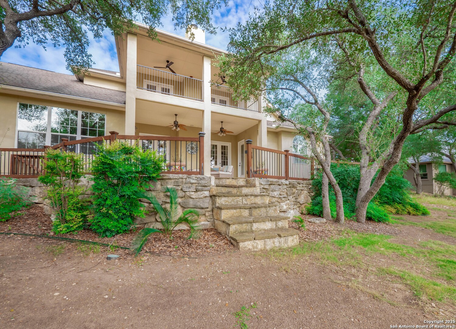 429 Fossil Hills Loop Spring Branch, TX 78070 - Photo 48 of 64 front view of a house with a yard
