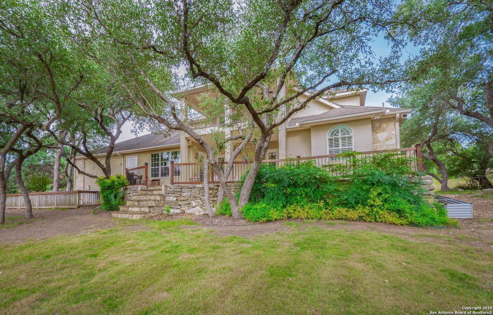 429 Fossil Hills Loop Spring Branch, TX 78070 - Photo 49 of 64 front view of a house with a yard