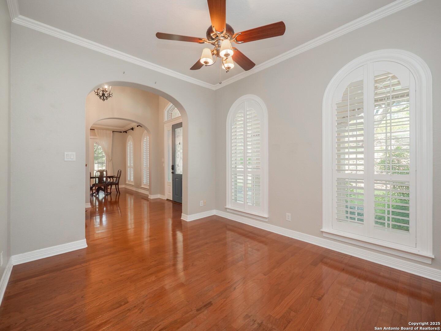 429 Fossil Hills Loop Spring Branch, TX 78070 - Photo 5 of 64 wooden floor in an empty room with a window