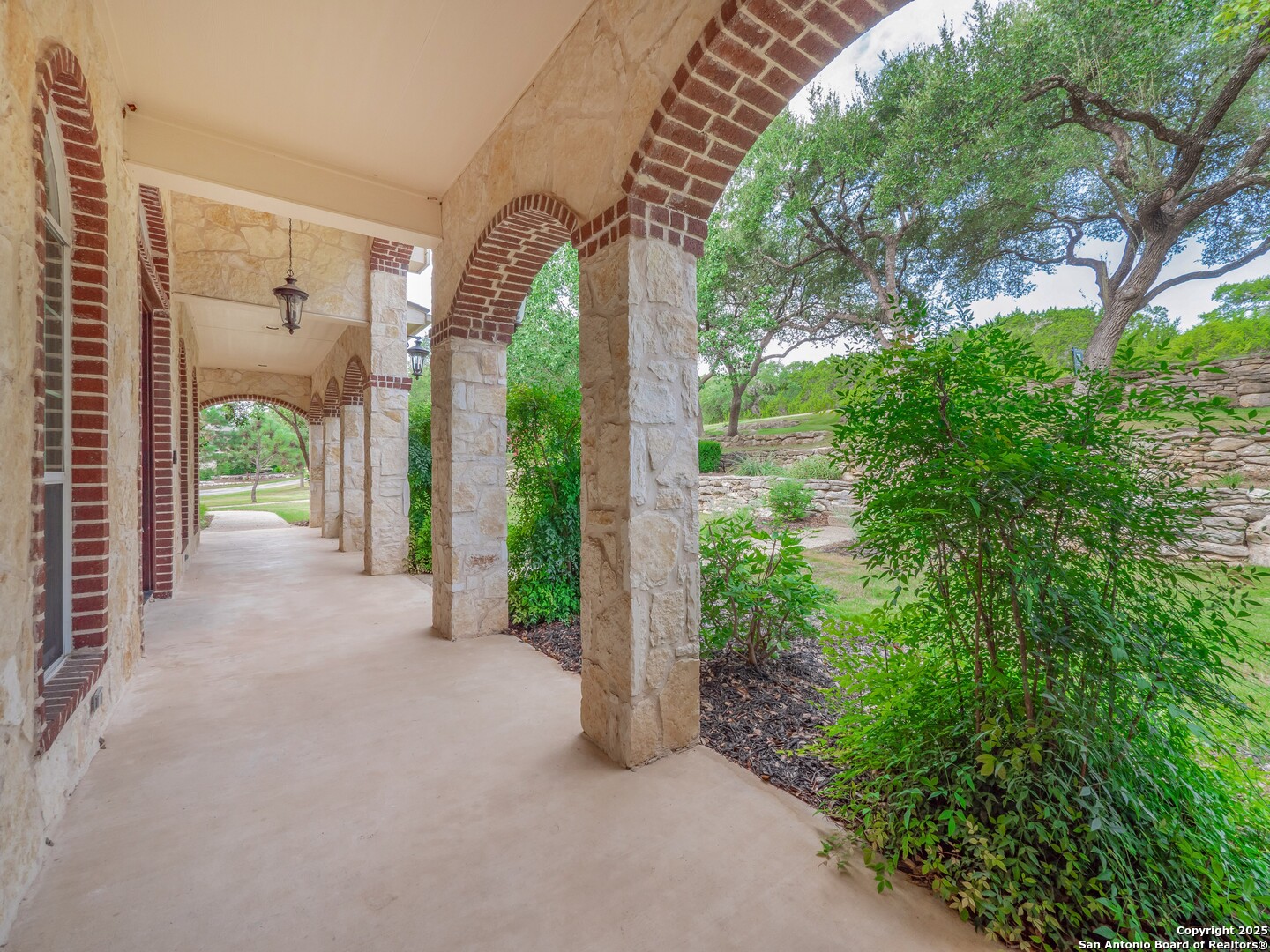 429 Fossil Hills Loop Spring Branch, TX 78070 - Photo 54 of 64 a view of a house with a porch