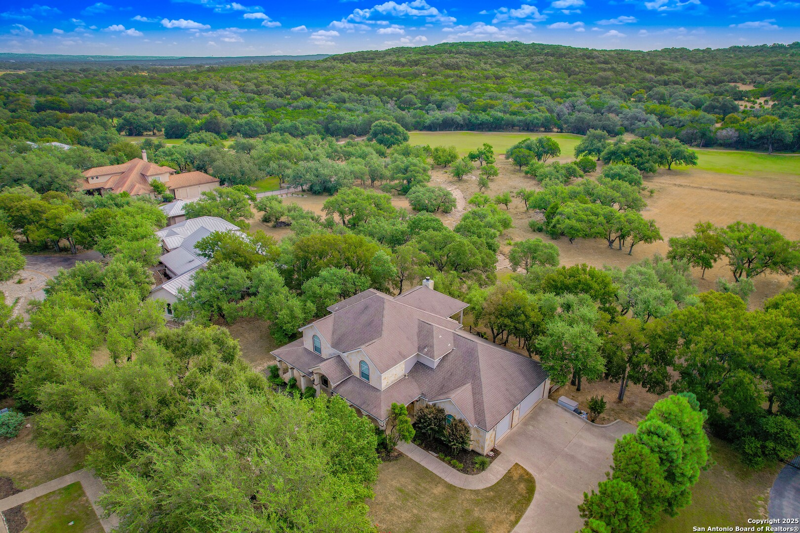 429 Fossil Hills Loop Spring Branch, TX 78070 - Photo 57 of 64 a view of a garden with an outdoor space