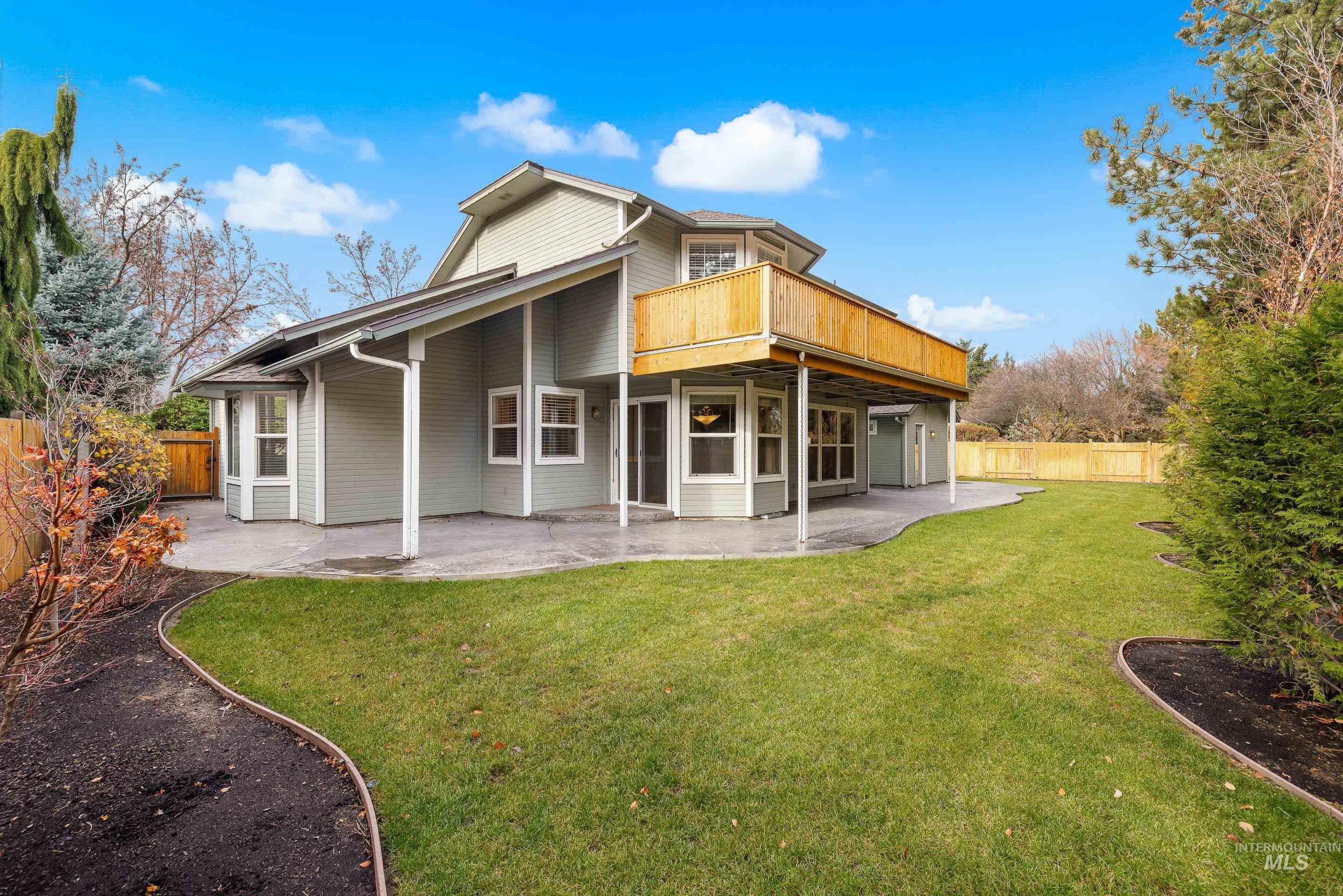 7736 West Bayhill Street Boise, ID 83704 - Photo 39 of 50 Back of house featuring a patio area, a fenced backyard, and a deck