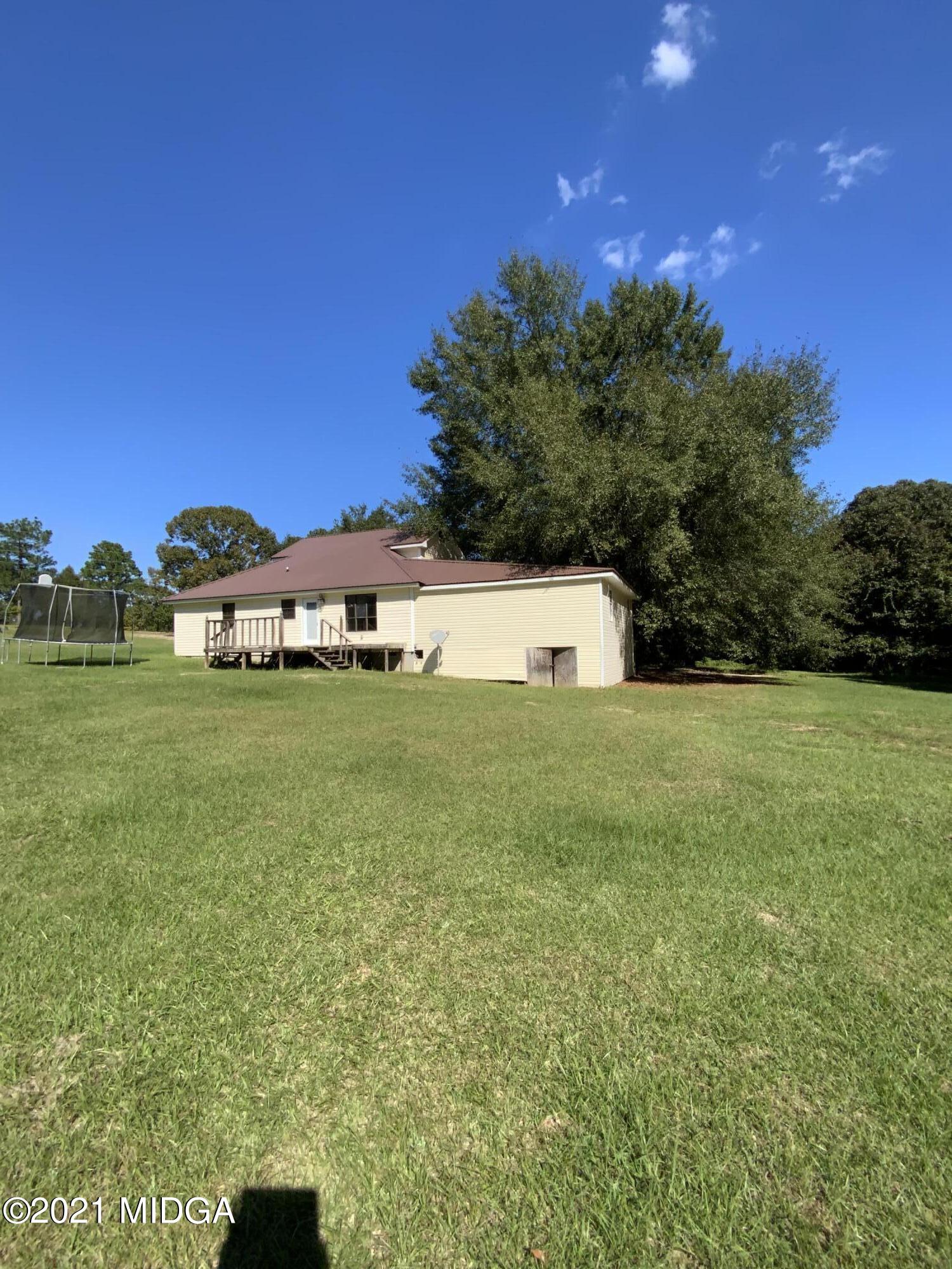 3482 Jordan Road Byron, GA 31008 - Photo 17 of 18 a house view with a garden