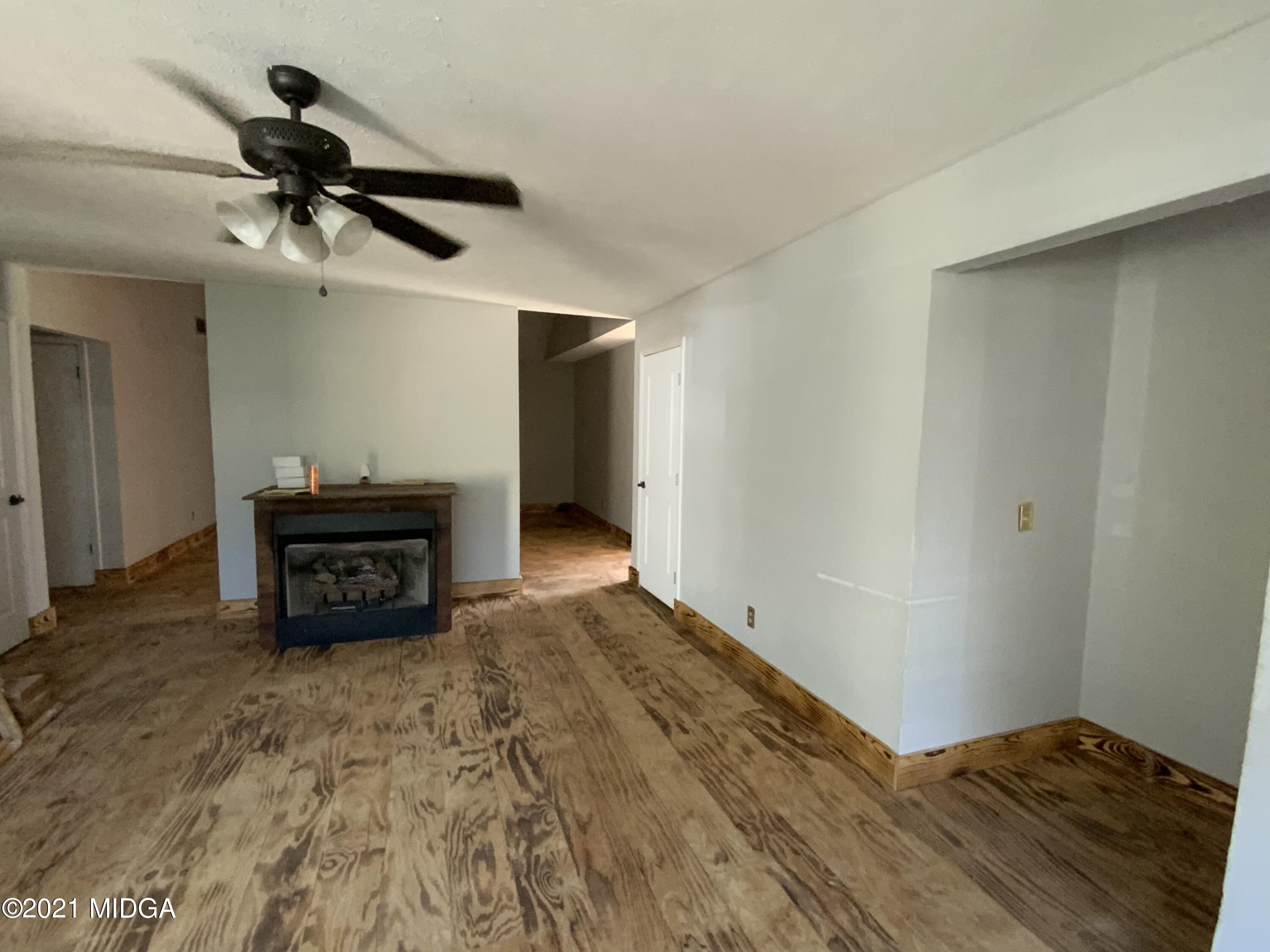 3482 Jordan Road Byron, GA 31008 - Photo 4 of 18 a view of empty room with ceiling fan