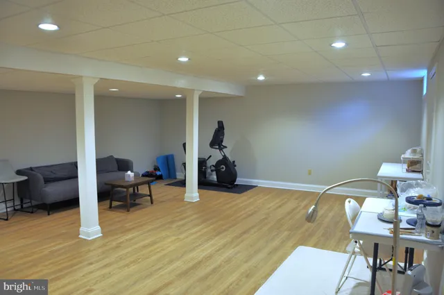 a room with furniture and a wooden floor