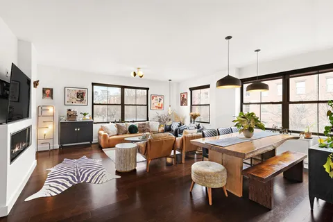 a view of a city with mountains in the background