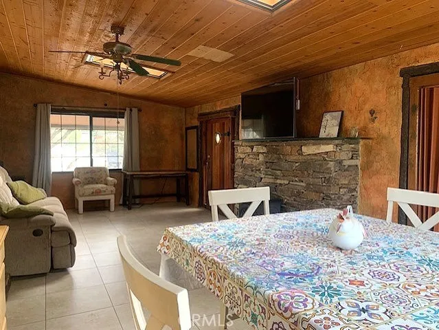 a bed room with a bed and a television