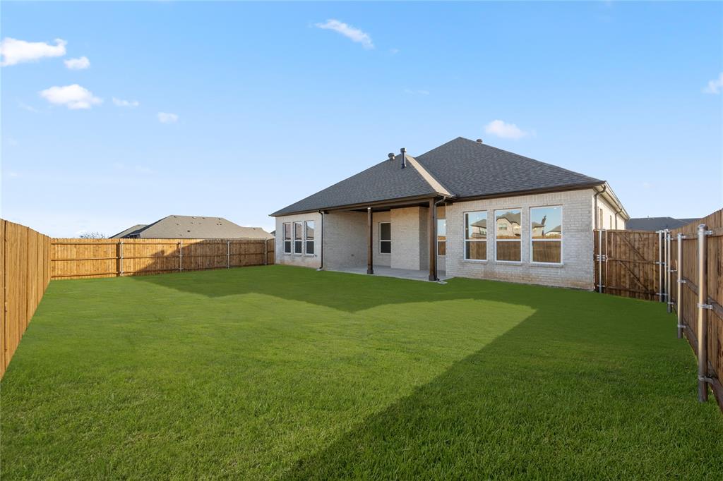 1016 Mill Ridge Drive Justin, TX 76247 - Photo 4 of 28 1016 Mill Ridge- Back-1