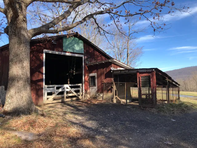 a view of mountain with sunset
