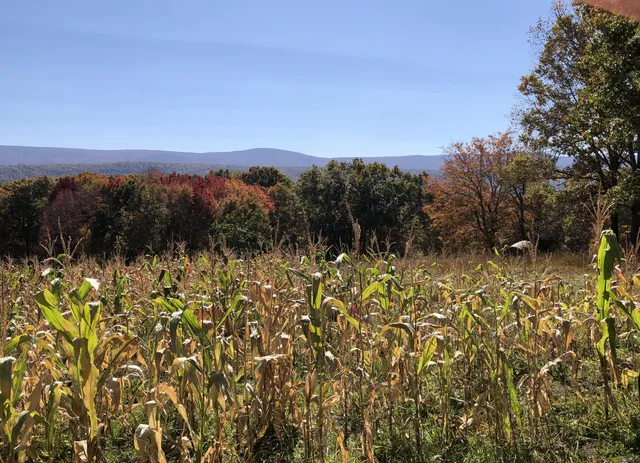 a view of mountain view with mountains in the background