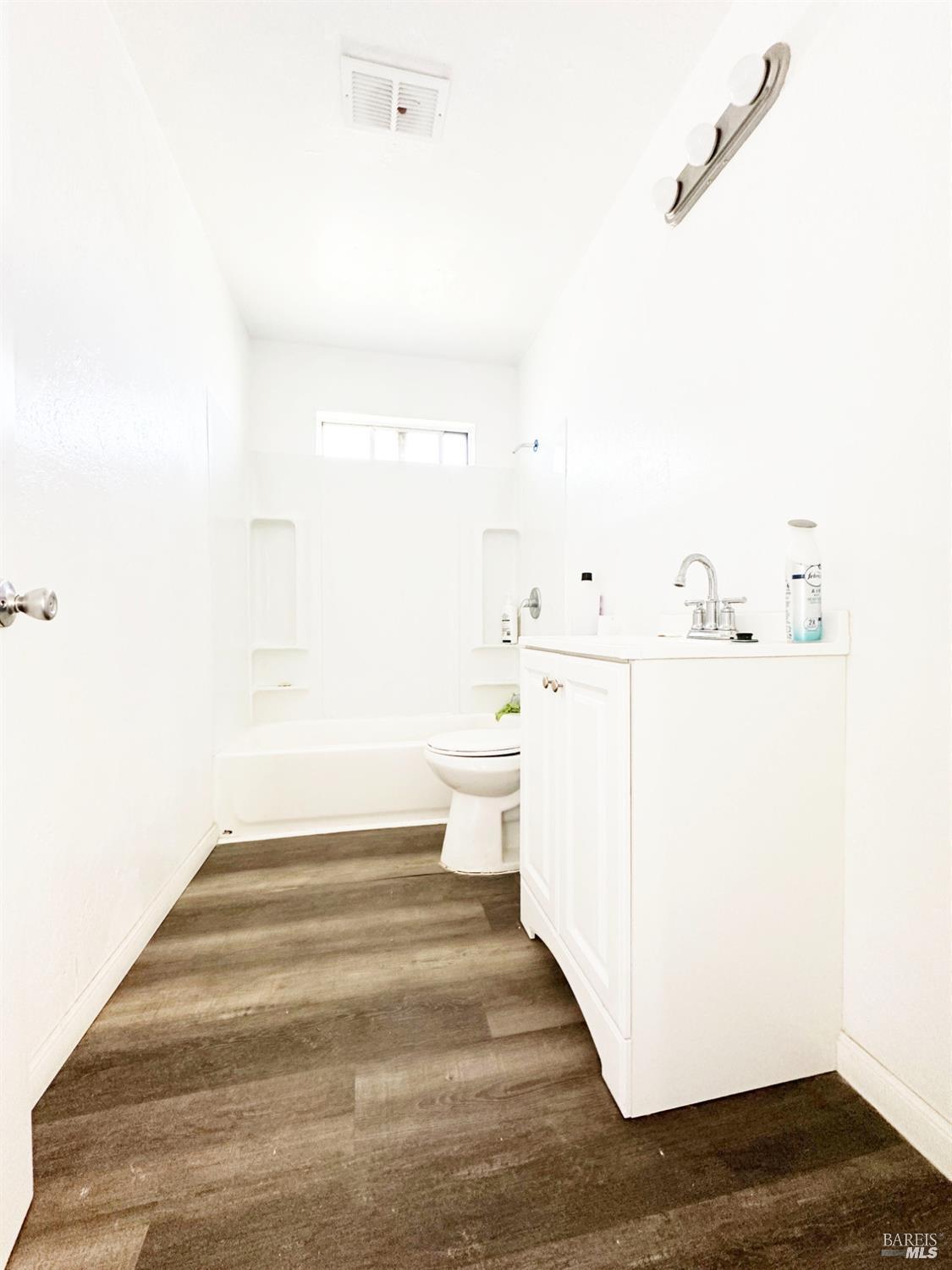 4083 Frye Avenue Clearlake, CA 95422 - Photo 8 of 18 a view of a hallway with white walls