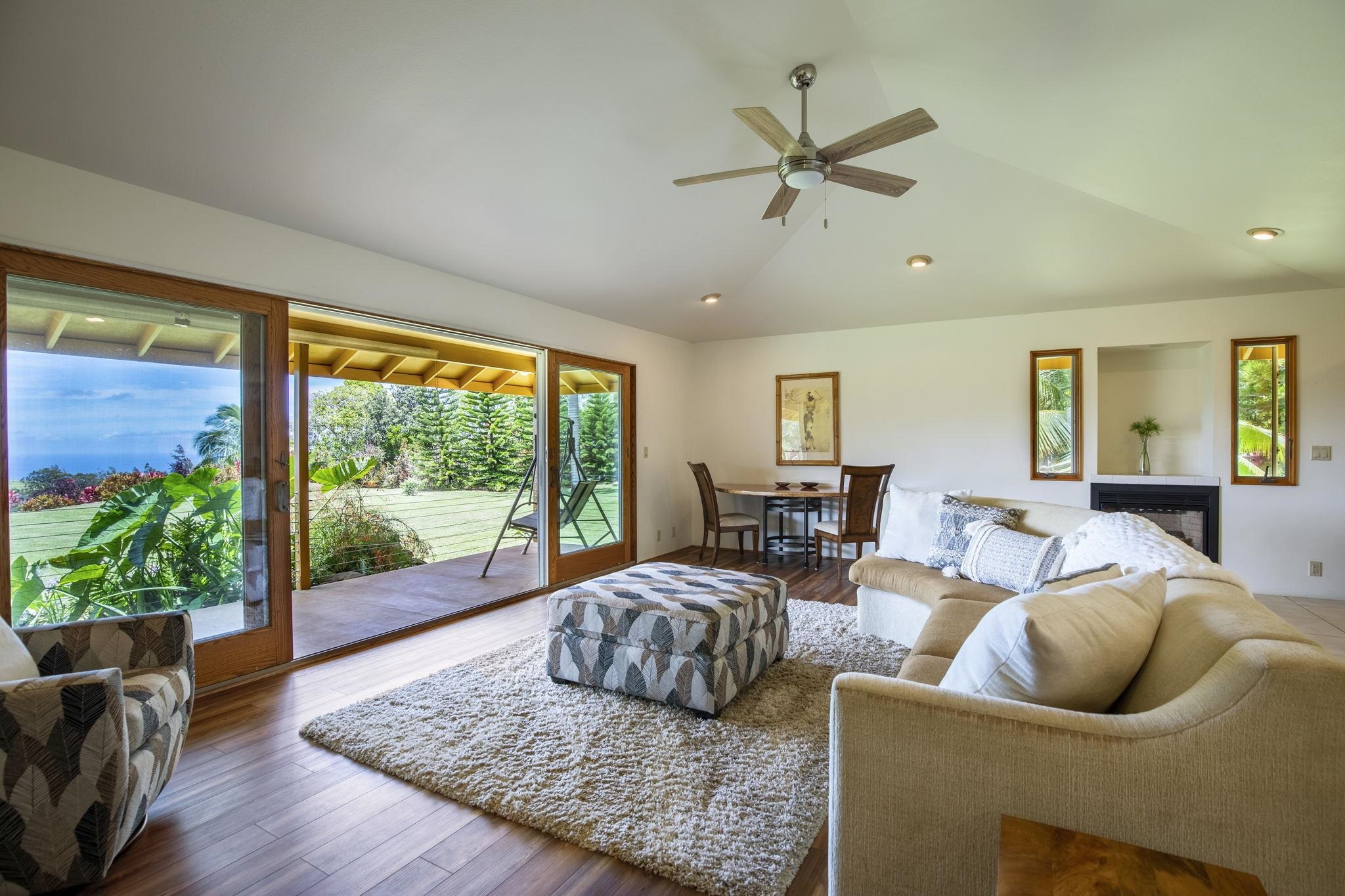 207 Uakoko Place Haiku, HI 96708 - Photo 21 of 30 a living room with furniture and a large window