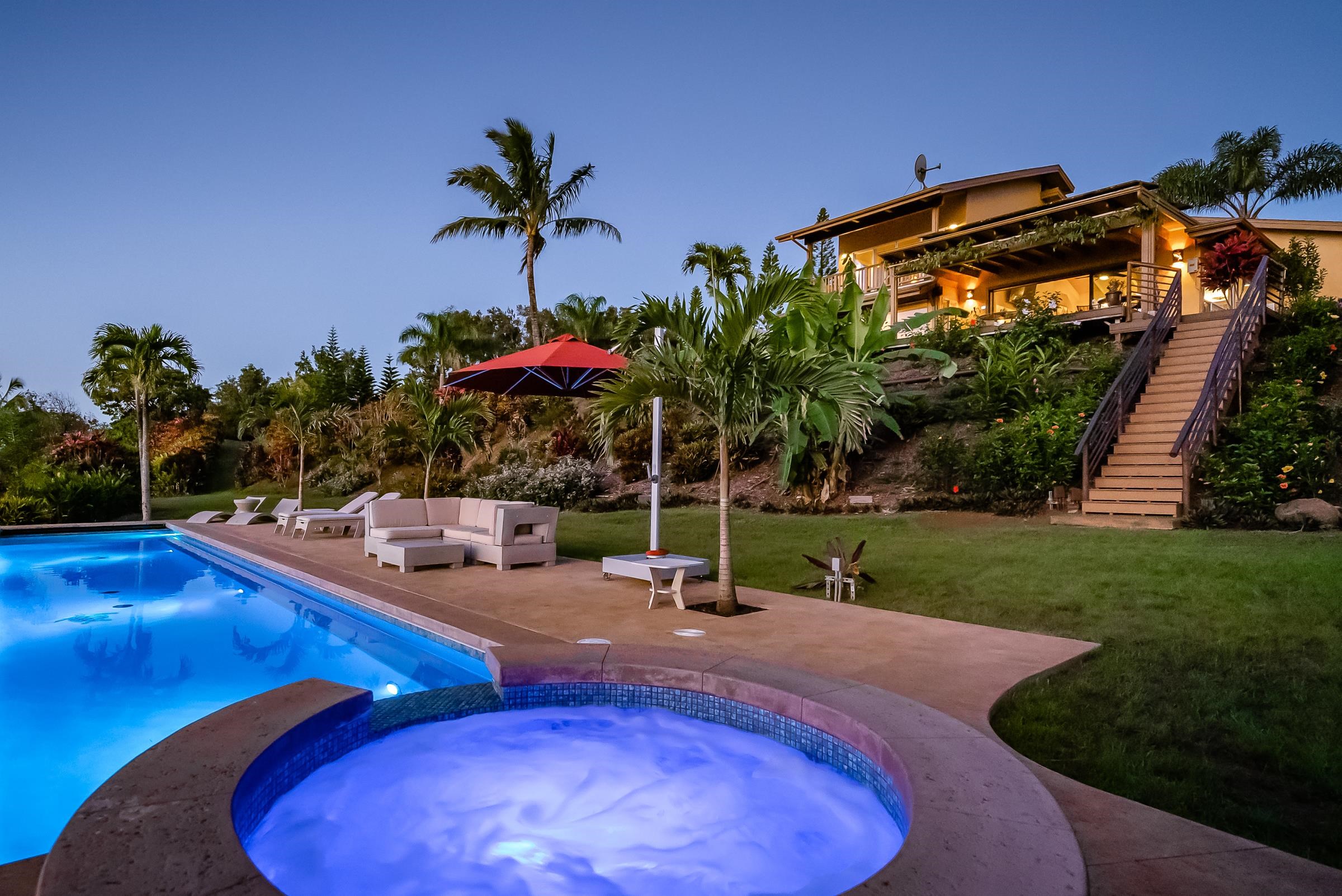 207 Uakoko Place Haiku, HI 96708 - Photo 29 of 30 a view of a backyard with a patio and swimming pool