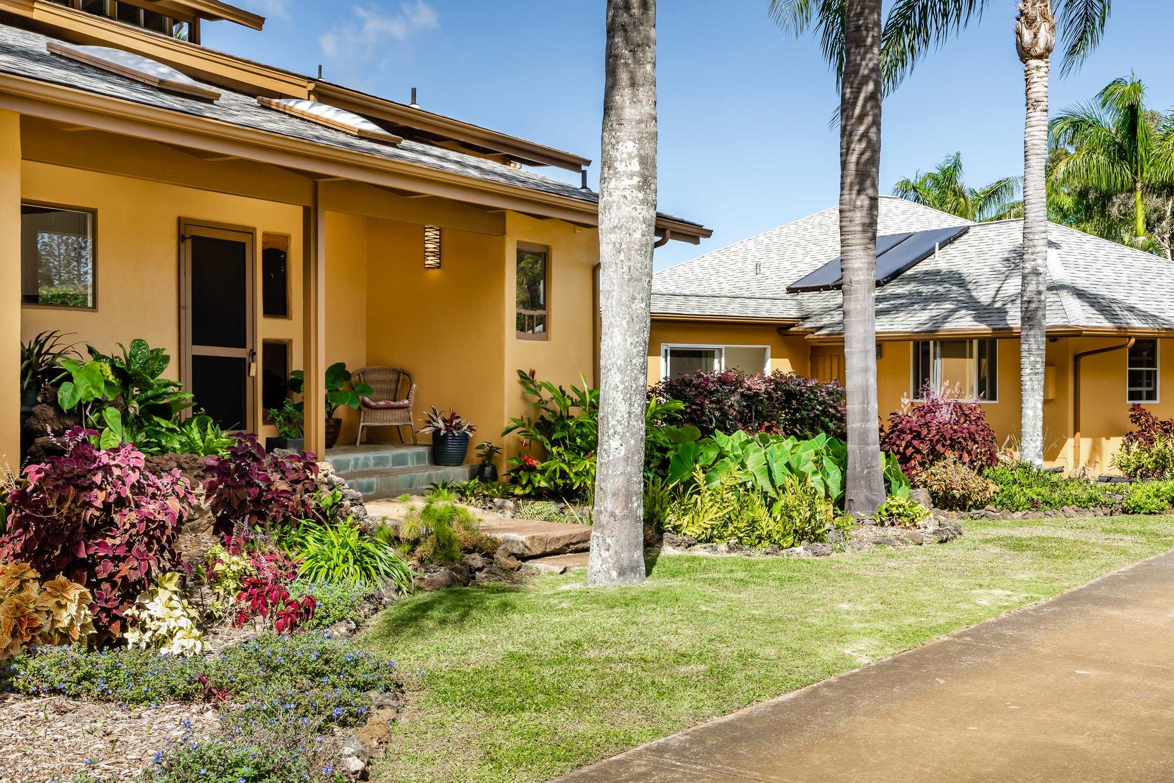 207 Uakoko Place Haiku, HI 96708 - Photo 4 of 30 a view of a house with a yard and plants