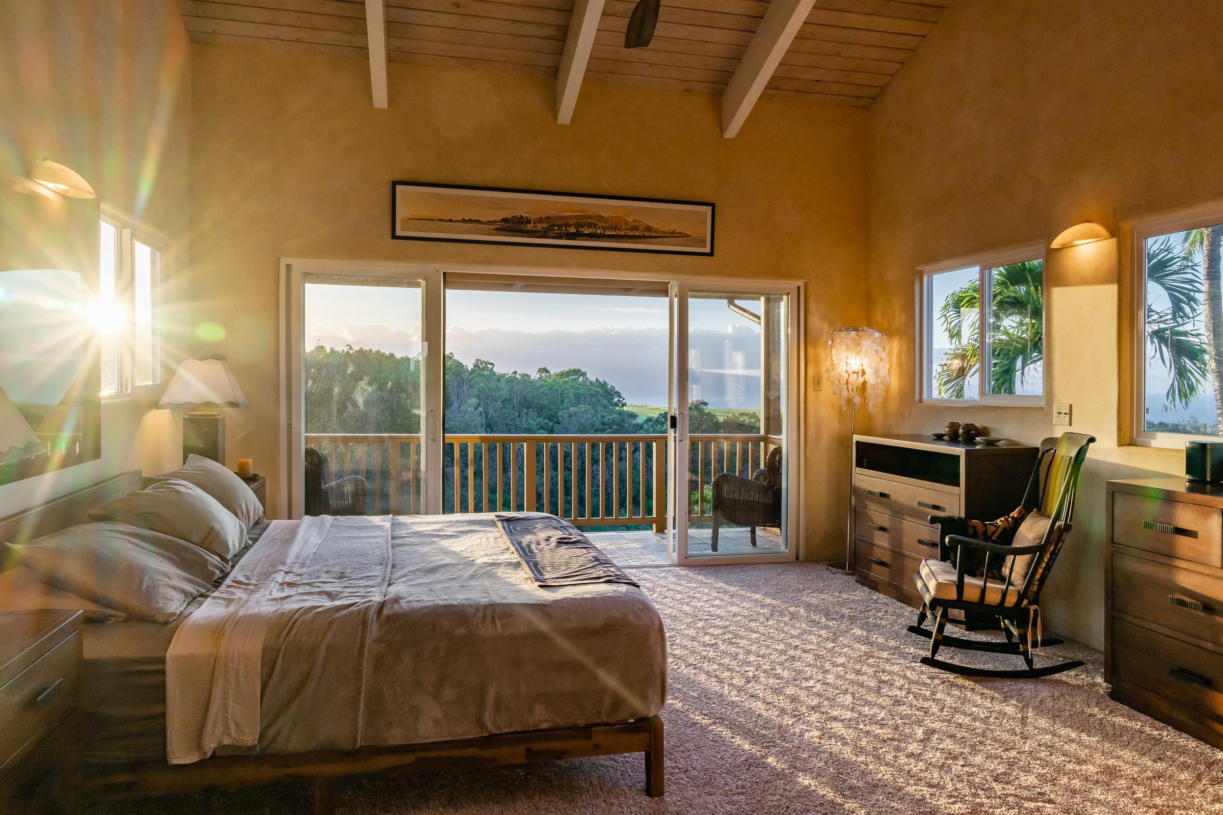 207 Uakoko Place Haiku, HI 96708 - Photo 9 of 30 a bedroom with a bed a table and chair