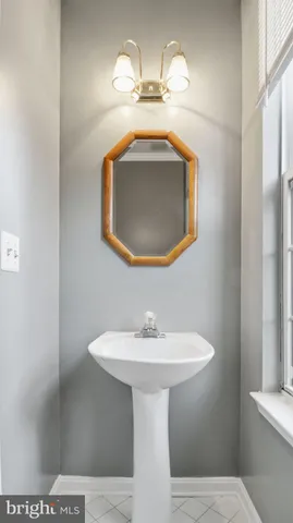 a kitchen with stainless steel appliances granite countertop a stove sink and cabinets