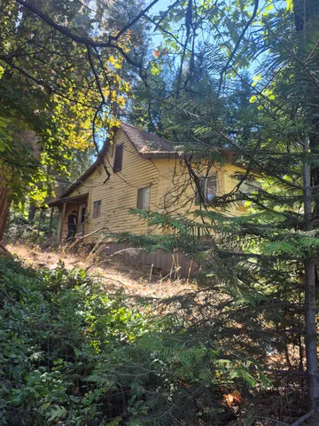 a backyard of a house with lots of green space