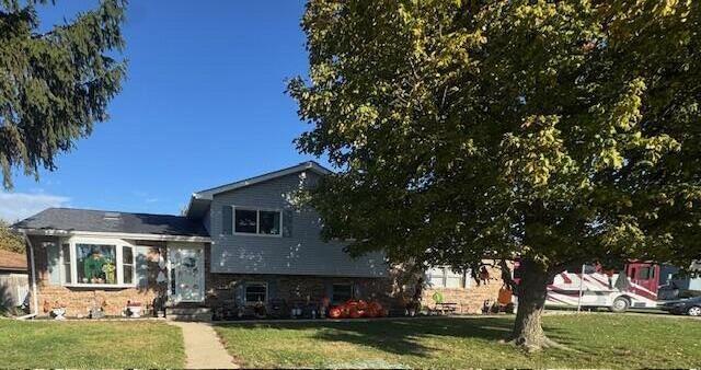 6100 Robbins Road Portage, IN 46368 - Photo 1 of 31 a view of a house with swimming pool and a yard