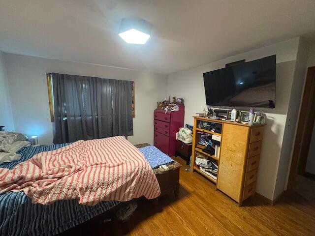 6100 Robbins Road Portage, IN 46368 - Photo 13 of 31 a bedroom with a bed and a flat screen tv