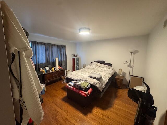 6100 Robbins Road Portage, IN 46368 - Photo 15 of 31 a bedroom with a bed dresser and a window