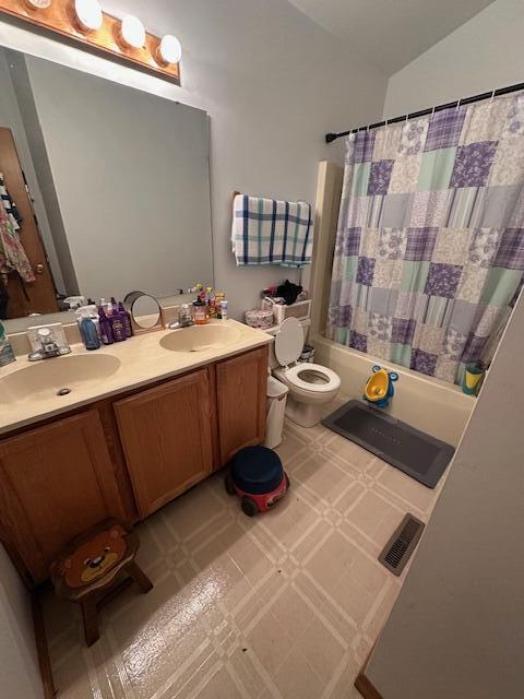 6100 Robbins Road Portage, IN 46368 - Photo 28 of 31 a view of a bathroom with a sink and a mirror