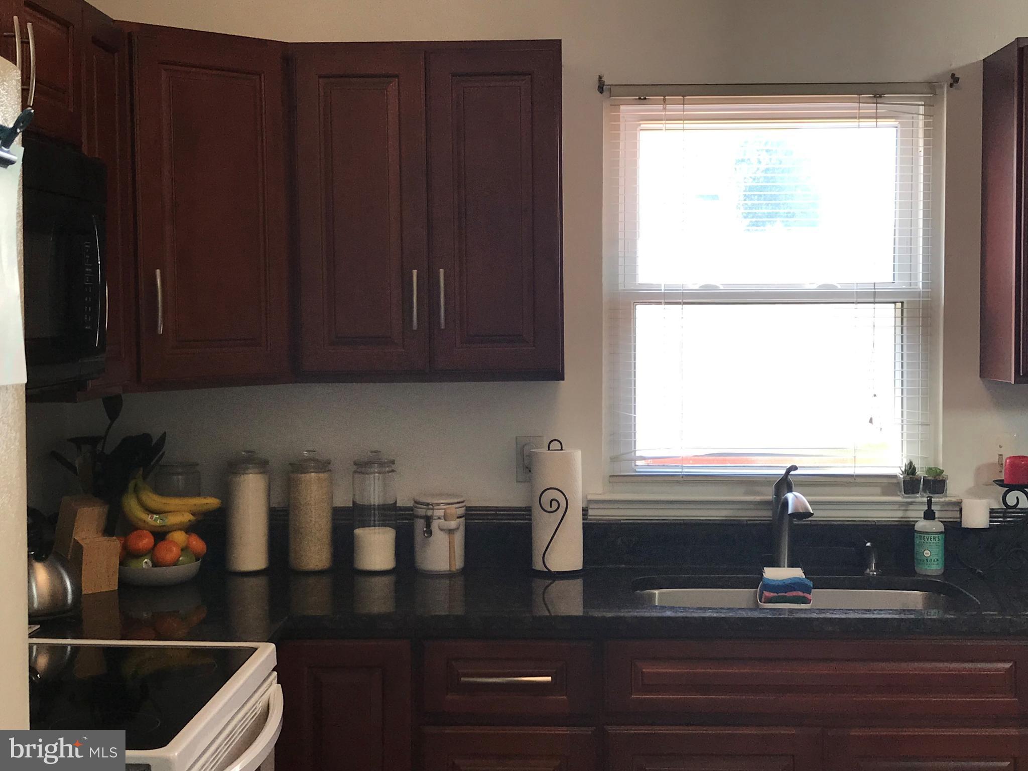 8621 Windmill Road Randallstown, MD 21133 - Photo 7 of 17 Kitchen Cabinets