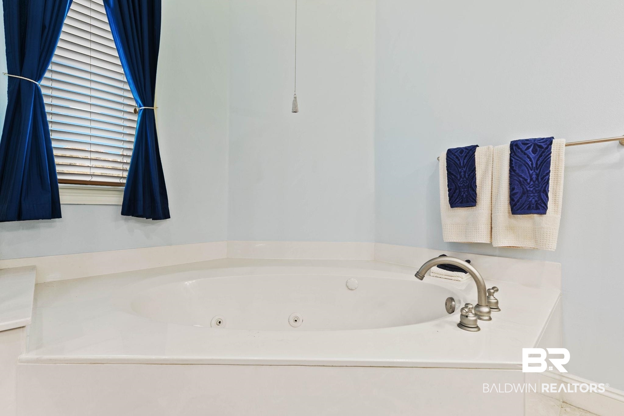 28250 Canal Road, Unit 208 Orange Beach, AL 36561 - Photo 33 of 53 Full bath featuring a jetted tub and tile patterned floors