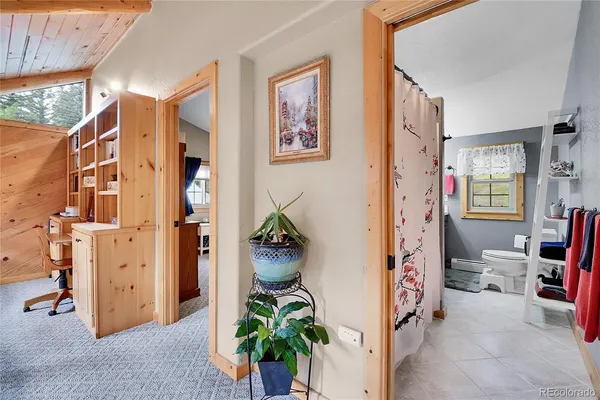 a view of a entryway with furniture and floor to ceiling window