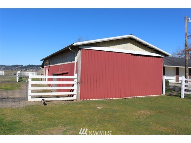 2127 Rice Road Chehalis, WA 98532 - Photo 17 of 25 a view of a backyard with a house