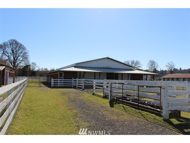 2127 Rice Road Chehalis, WA 98532 - Photo 20 of 25 a view of a house with yard and sitting area