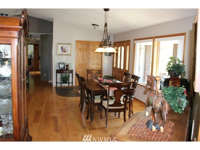 2127 Rice Road Chehalis, WA 98532 - Photo 8 of 25 a view of a dining room with furniture and chandelier
