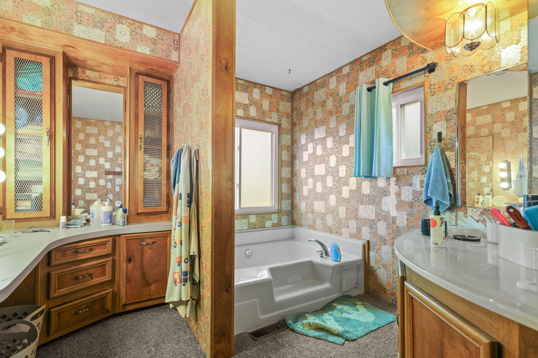 5722 Happy Valley Road Anderson, CA 96007 - Photo 13 of 29 a bathroom with a tub sink and mirror