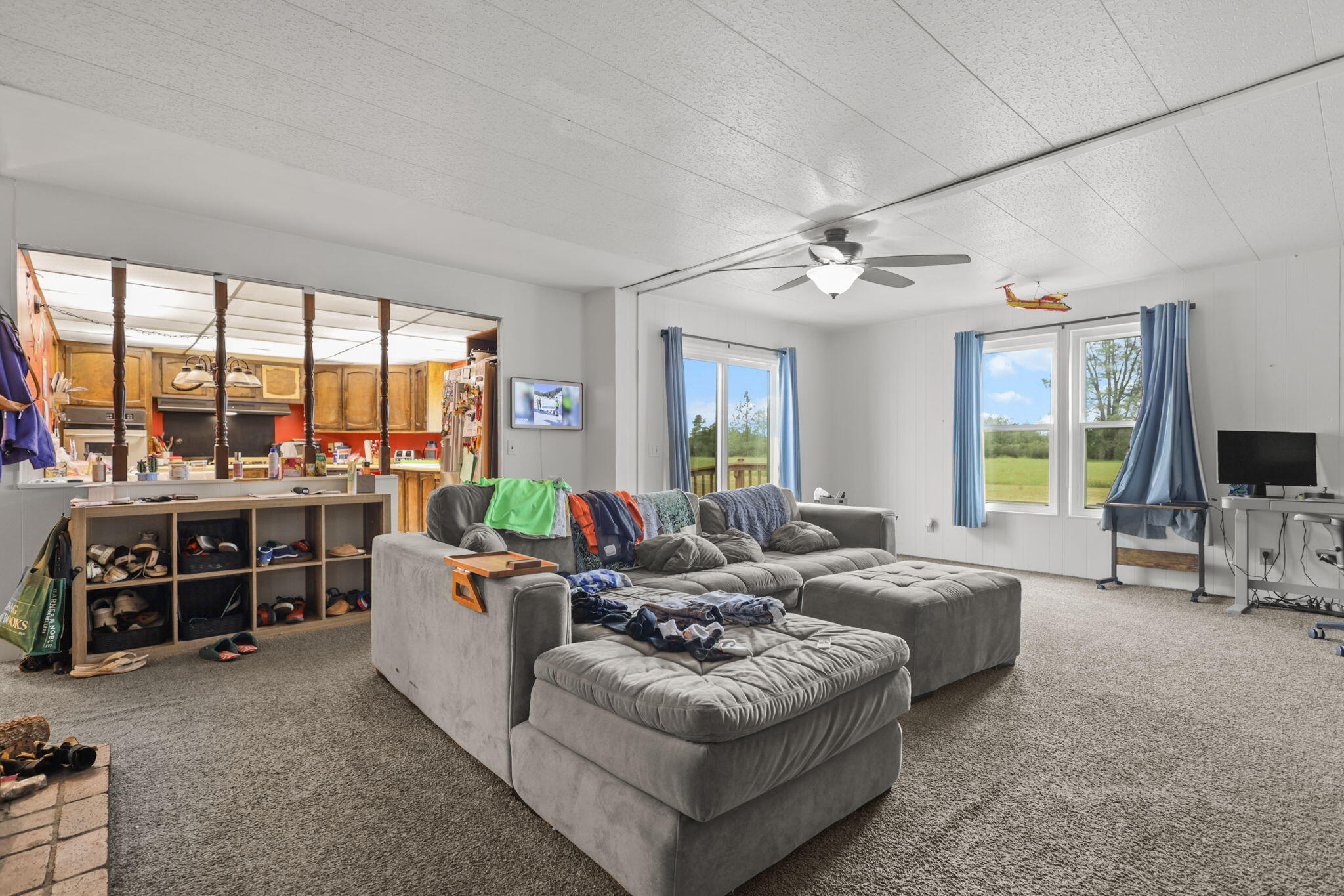 5722 Happy Valley Road Anderson, CA 96007 - Photo 2 of 29 a living room with furniture and large windows