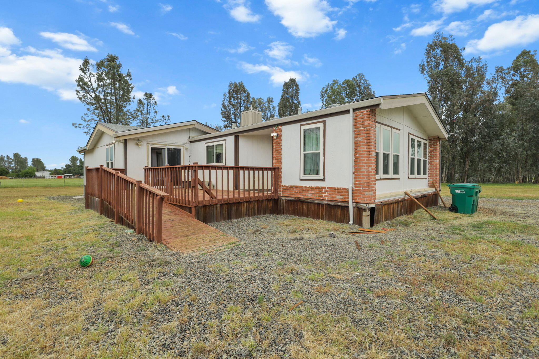 5722 Happy Valley Road Anderson, CA 96007 - Photo 22 of 29 a view of a house with wooden fence
