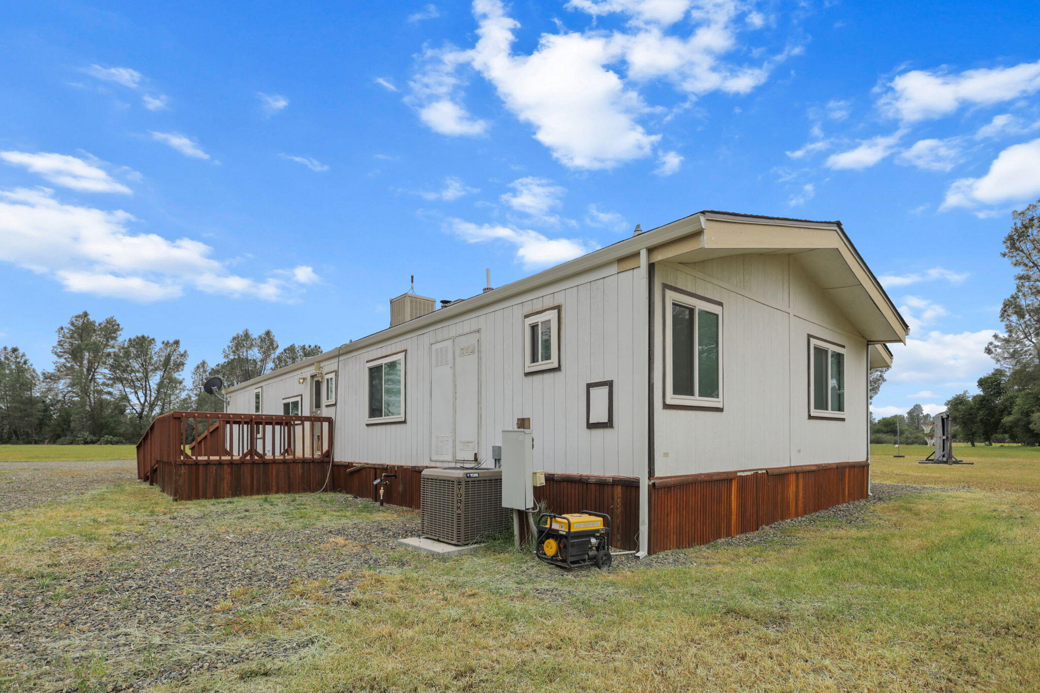 5722 Happy Valley Road Anderson, CA 96007 - Photo 26 of 29 a view of a house with a yard