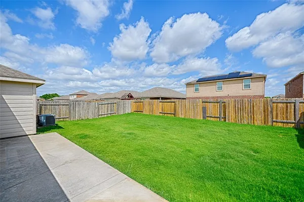 a view of a building with a swimming pool