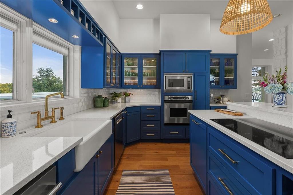 9308 Lechner Road Fort Worth, TX 76179 - Photo 15 of 40 a kitchen with stainless steel appliances granite countertop a sink stove and refrigerator