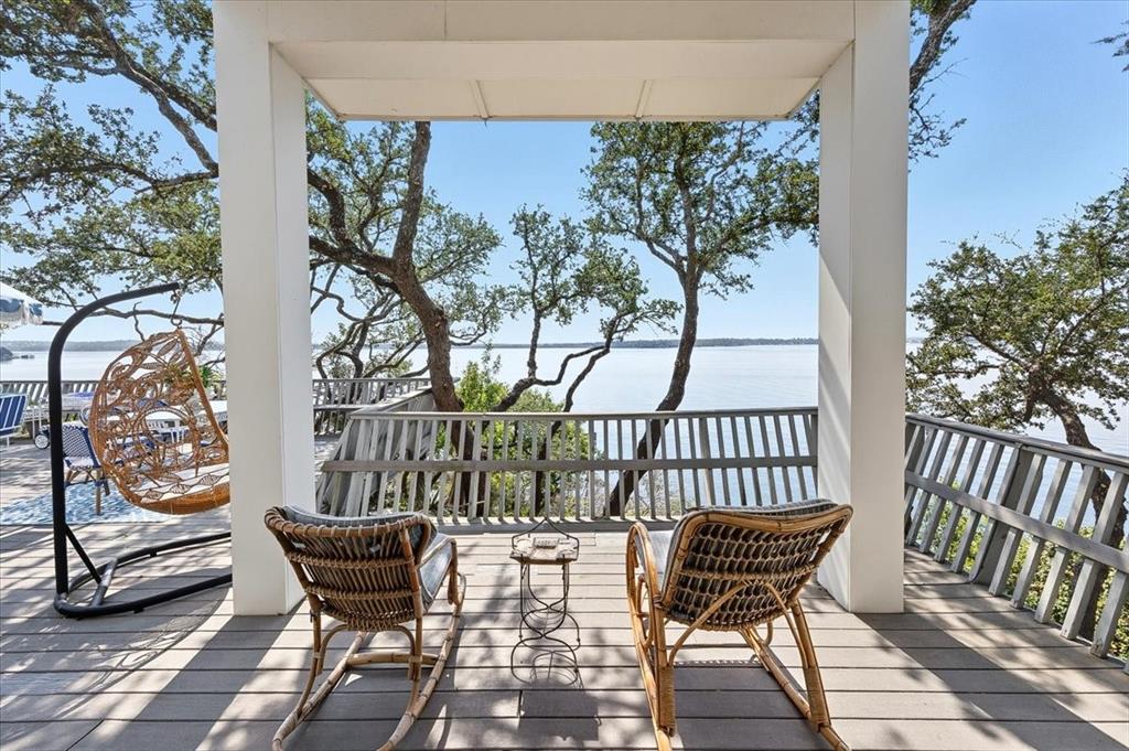 9308 Lechner Road Fort Worth, TX 76179 - Photo 27 of 40 a view of a chairs in wooden deck
