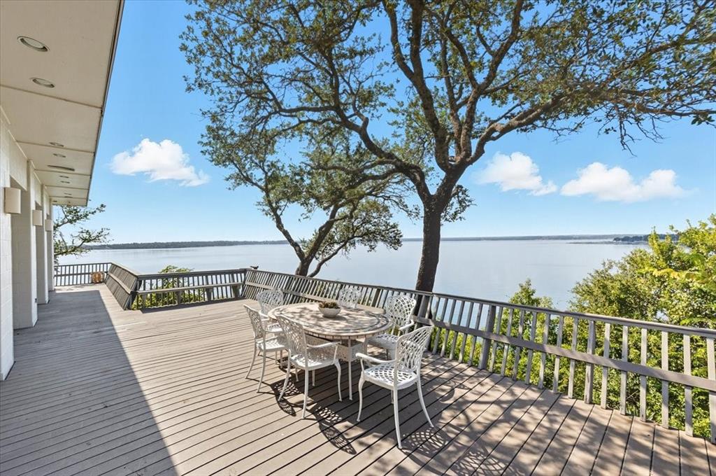 9308 Lechner Road Fort Worth, TX 76179 - Photo 29 of 40 a view of a chairs and table on the wooden floor