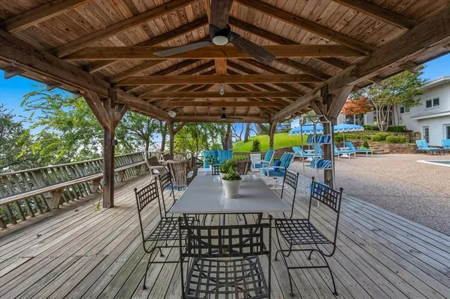 a view of a swimming pool with a patio