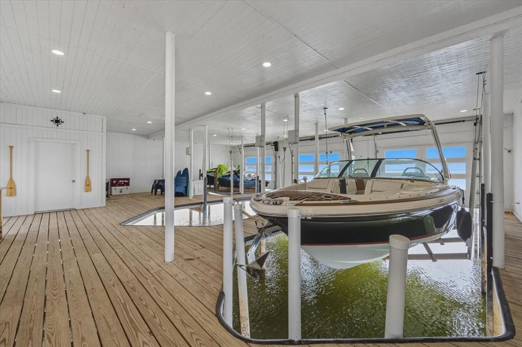 9308 Lechner Road Fort Worth, TX 76179 - Photo 38 of 40 a kitchen with stainless steel appliances granite countertop a stove and a wooden floors