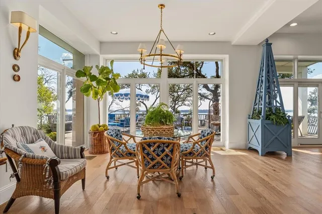 a view of a dining room with furniture window and outside view