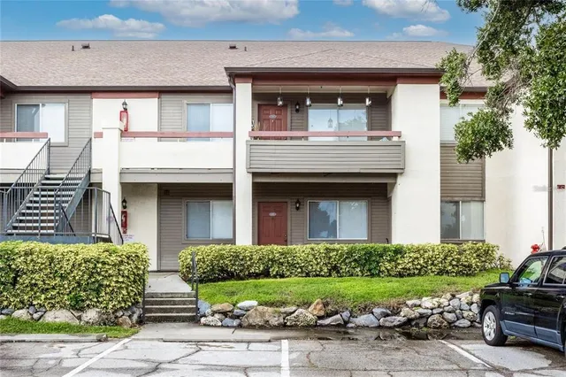 a view of a swimming pool with lounge chair