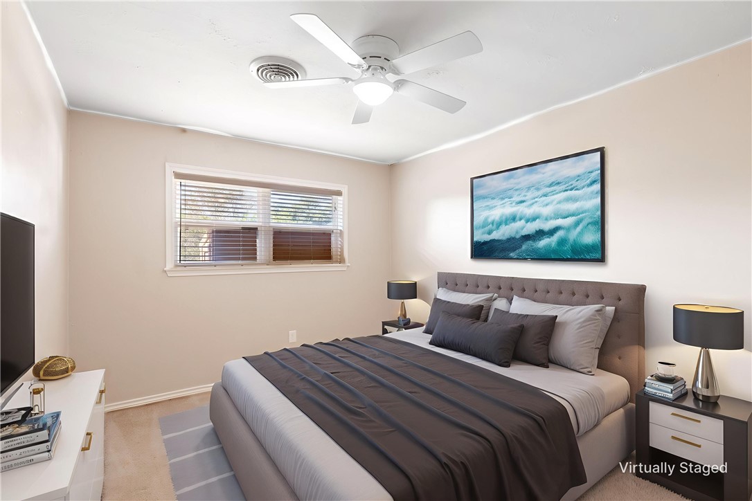 2316 Kent Street Bryan, TX 77802 - Photo 23 of 31 a bedroom with bed and window