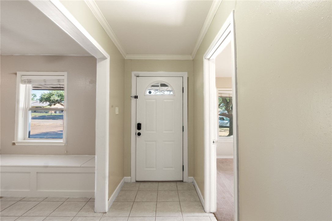 2316 Kent Street Bryan, TX 77802 - Photo 3 of 31 a view of a hallway with windows and entryway