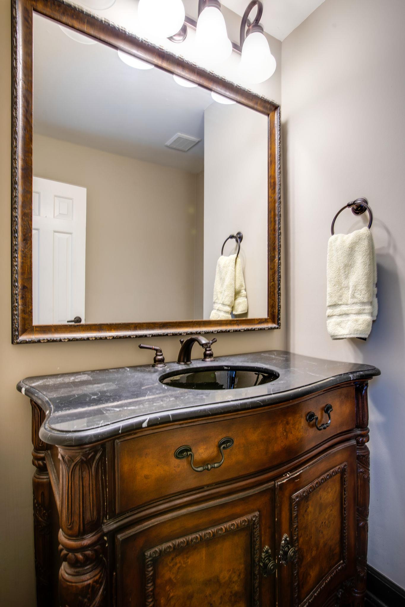 6737 Holt Road Nashville, TN 37211 - Photo 14 of 28 Powder Room with handsome vanity