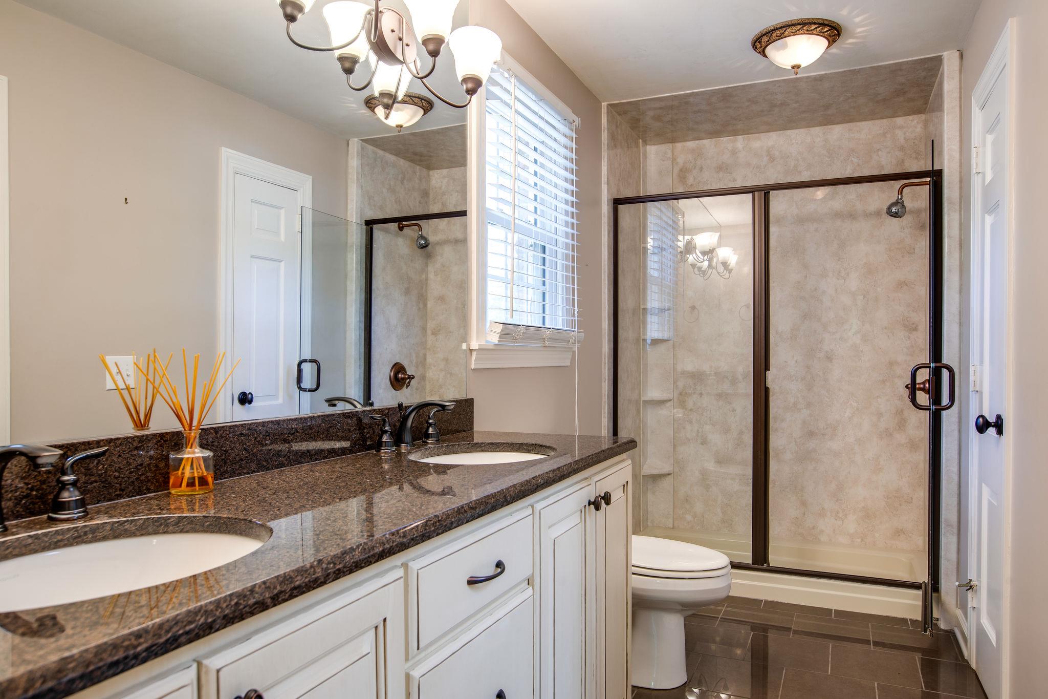 6737 Holt Road Nashville, TN 37211 - Photo 16 of 28 Master Bath with custom vanity and ceramic shower